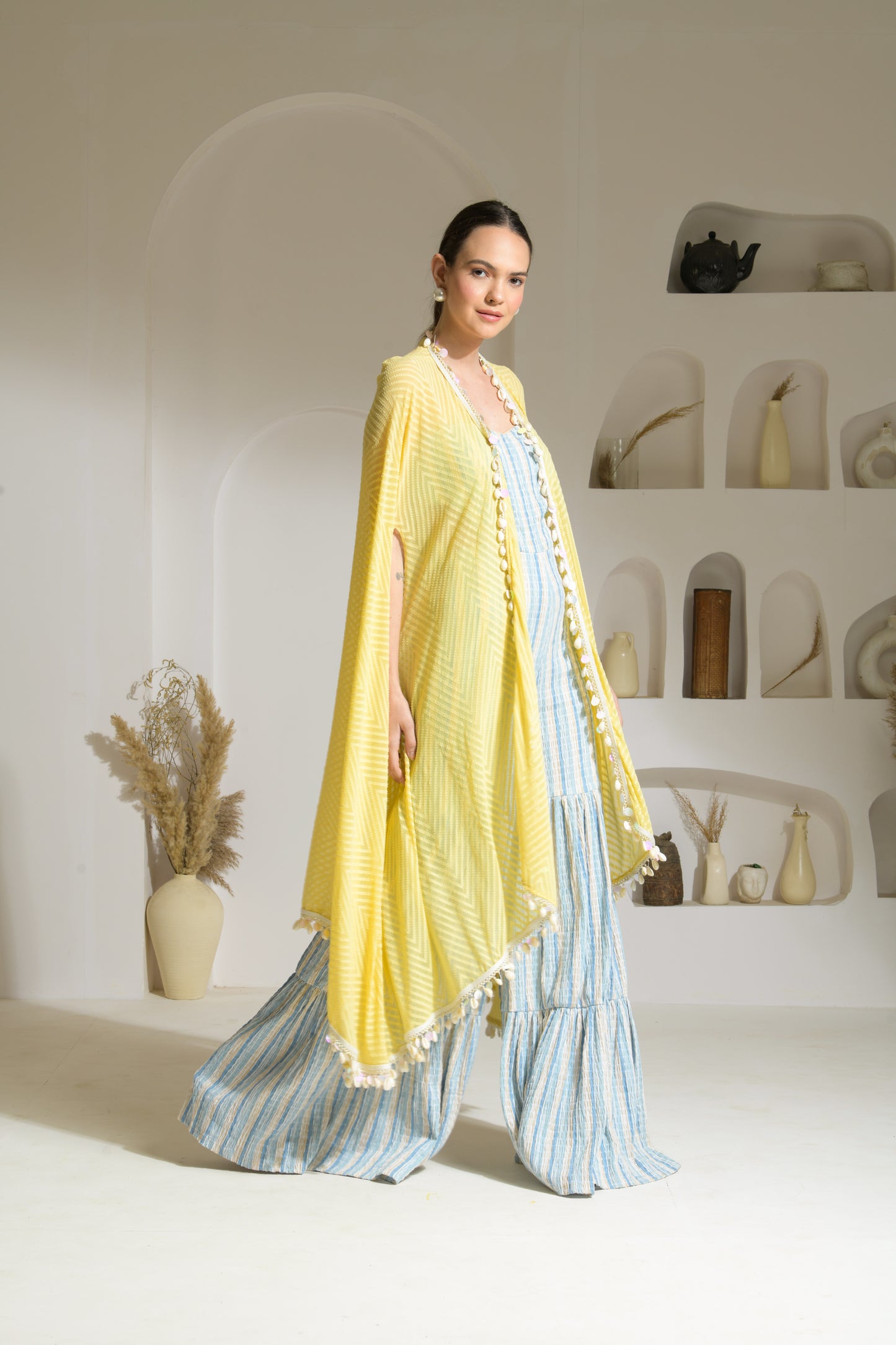 Aamira Striped Strapless cut-out Jumpsuit with flared pants with textured georgette Cape- Set of 2
