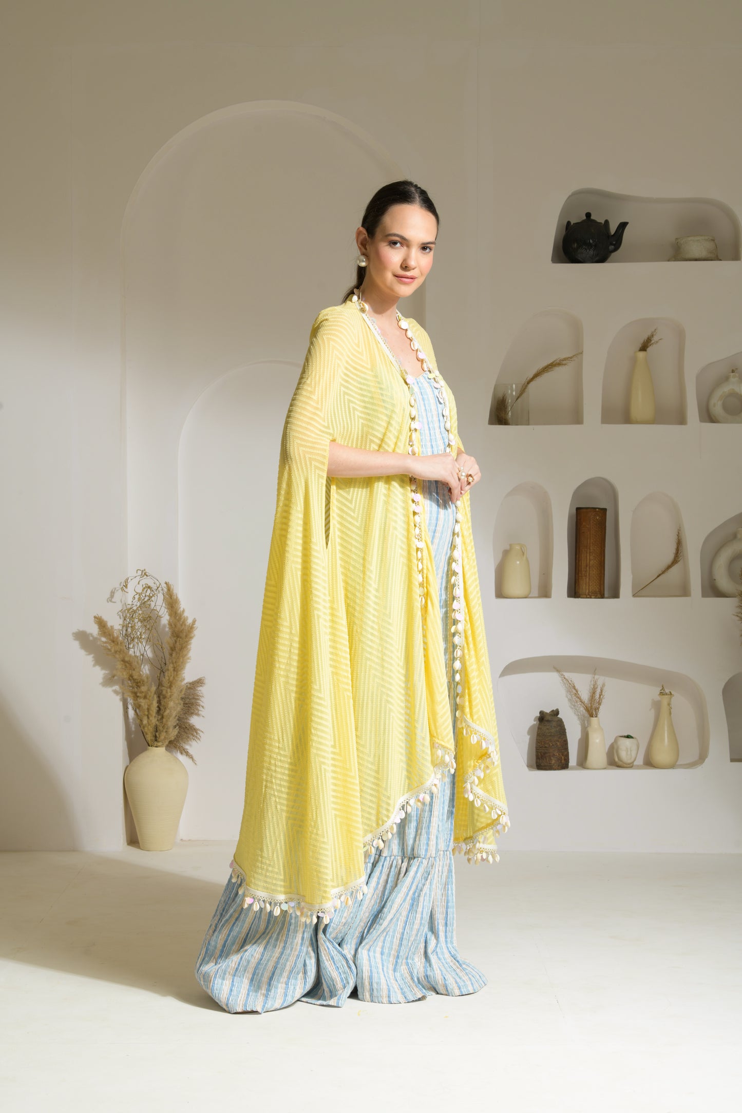 Aamira Striped Strapless cut-out Jumpsuit with flared pants with textured georgette Cape- Set of 2