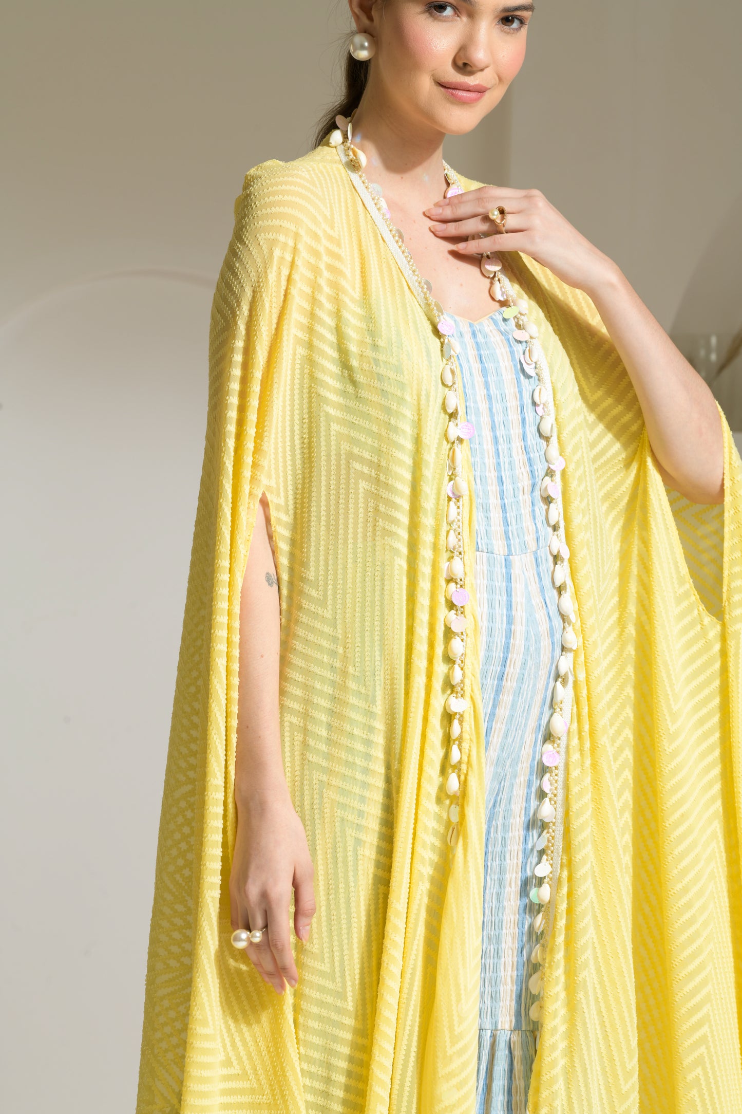 Aamira Striped Strapless cut-out Jumpsuit with flared pants with textured georgette Cape- Set of 2
