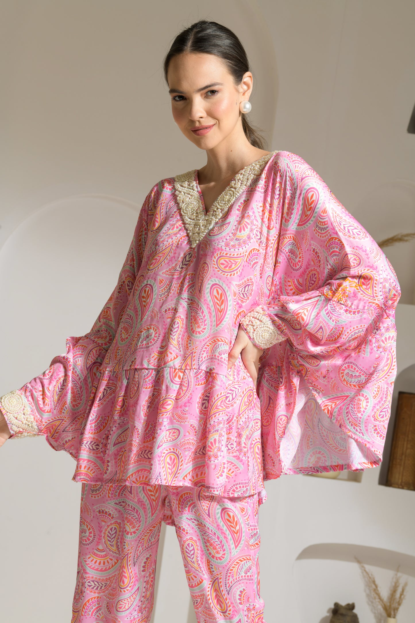 Bahaar Pink Paisley Print Poncho style top with Embroidered pearl neckline and straight fit pants - Set of 2
