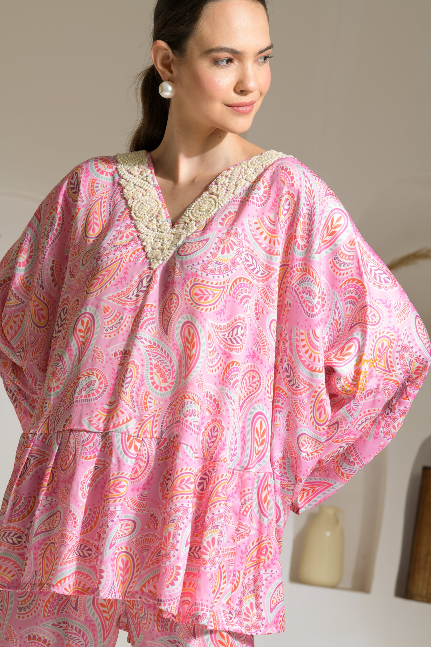 Bahaar Pink Paisley Print Poncho style top with Embroidered pearl neckline and straight fit pants - Set of 2