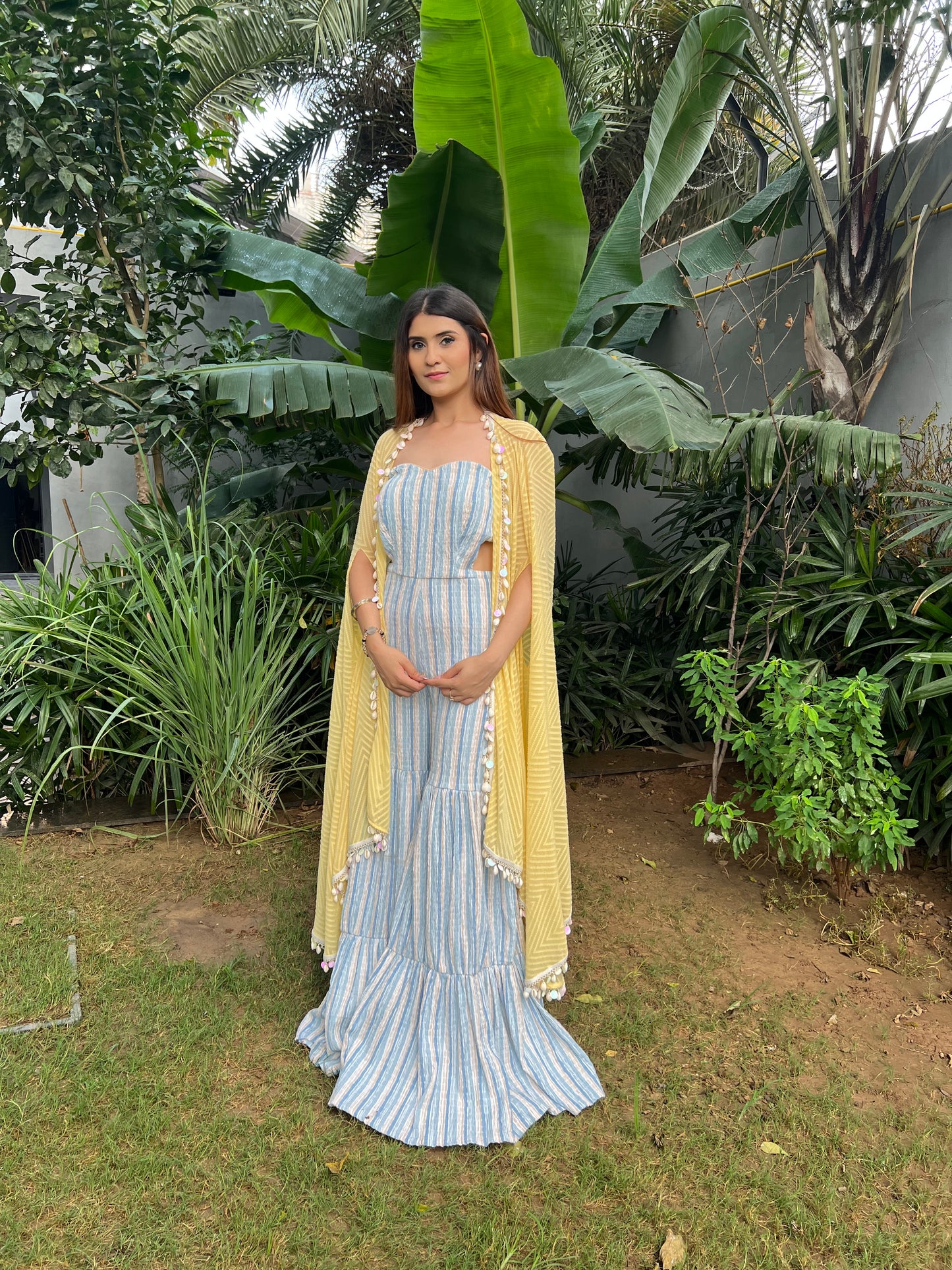 Aamira Striped Strapless cut-out Jumpsuit with flared pants with textured georgette Cape- Set of 2